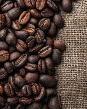 Coffee Beans on Burlap Backgroun
