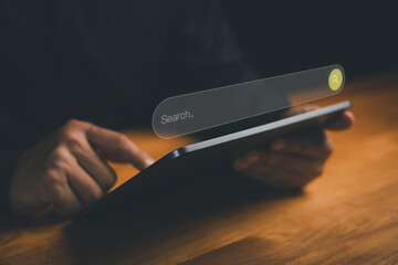 Person using tablet with search bar. Technology concept of data search in daily life, learning outside, social media, big data analysis and smart technology innovation for digital solutions.