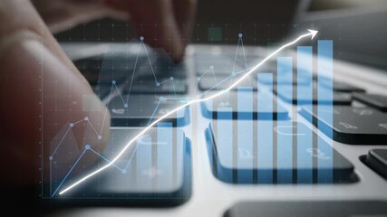 A close-up view of hands on a keyboard with an overlay of a dynamic graph illustrating growth trends, symbolizing modern financial analysis and digital strategies. Copula - Powered by Adobe