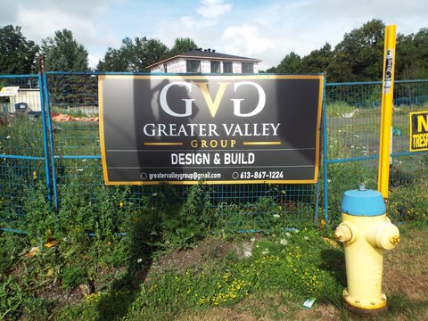 Nepean, ON, Canada, June 19, 2025: A construction or development sign for a company called "GREATER VALLEY GROUP" on Rideaucrest Dr.
