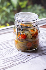 Hermetic Preserving Jar Filled with Pickled Habanero Peppers, Carrots, and Onions