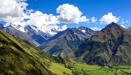 Mountain valley panorama with snow-capped peaks