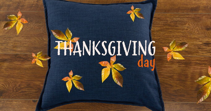 Fototapeta Image of thanksgiving day text over fall leaves and pillow