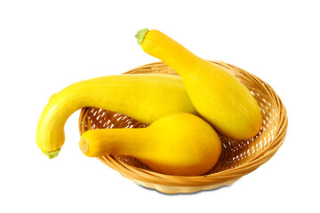 whole fresh yellow crookneck squash in basket, cutout in transparent background, png format 