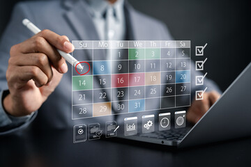 Calendar and checklist concept with businessman marking date on digital planner, schedule management, task planning, productivity, project organization, and business reminder.