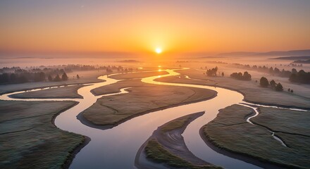 Serene river winding through landscape at sunrise under orange sky