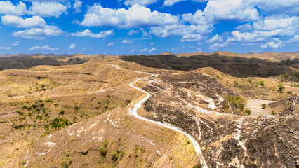 During the peak of summer 2025, Sumba's grass browns and withers, and its savannas are blackened by burn