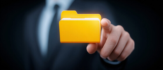 Businessman Activating Or Accessing A Digital Folder Icon On A Virtual Screen. Concept Of Cloud Storage, Data Management, Or File Organization.