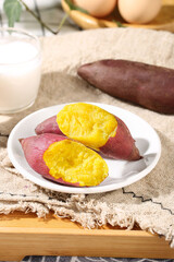 Fresh Cooked Sweet Potatoes with Yellow Flesh on White Plate - Healthy Organic Nutrition Food