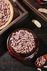 Dried Fennel Seeds in Wooden Bowls - Natural Spices and Cooking Ingredients on Rustic Wood Background