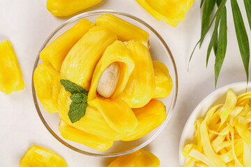 Fresh Yellow Jackfruit Slices in Bowl with Mint Garnish - Tropical Fruit Food Photography