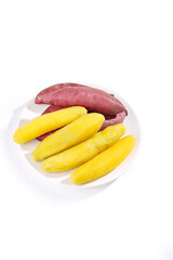 Fresh Sweet Potatoes Yellow and Red Varieties on White Plate Healthy Root Vegetables
