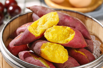 Steamed Sweet Potatoes with Golden Yellow Flesh in Traditional Bamboo Basket