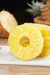 Fresh Golden Pineapple Rings with Diamond Pattern Pulp on Cutting Board