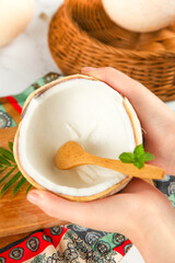 Fresh Coconut Milk in Natural Shell with Wooden Spoon - Tropical Healthy Drink
