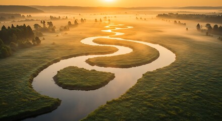 Serpentine river flowing through green meadow at sunrise landscape aerial view