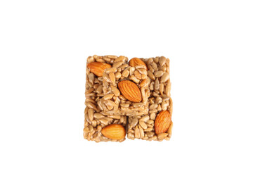 Handmade Nut Bar with Almonds and Seeds on White Background - Healthy Snack Food