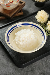 White Silver Ear Fungus Glutinous Mushroom Soup in Traditional Ceramic Bowl Asian Cuisine