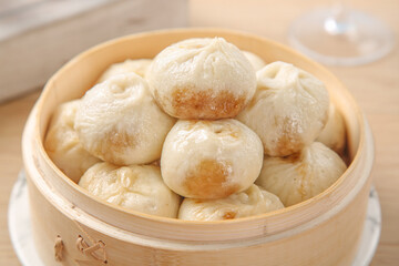 Steamed Xiao Long Bao Dumplings from Shengzhou in Bamboo Steamer - Traditional Chinese Soup Dumplings with Fresh Meat Filling