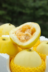 Golden Honeydew Melon Halves with Sweet Interior - Fresh Fruit Display