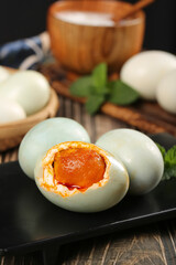 Gaoyou Salted Duck Eggs with Golden Yolk Traditional Chinese Delicacy on Slate Plate