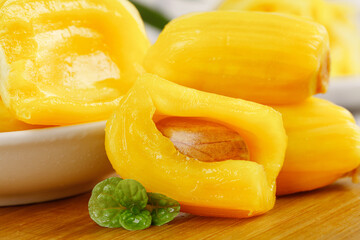 Fresh Thai Pineapple Rings with Golden Honey Flesh and Mint Garnish on Wooden Board