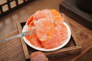 Sweet Dried Loquat Fruit Preserves on Wooden Tray - Healthy Natural Snack
