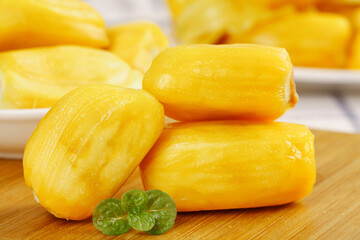 Fresh Jackfruit Segments with Mint Leaves on Wooden Board - Tropical Asian Fruit from Vietnam Borneo