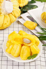 Fresh Vietnamese Honey Pineapple Slices with Golden Yellow Flesh on White Plate