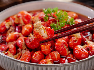 Fresh Cooked Crayfish Lobster Tail Pieces with Chopsticks - Traditional Asian Seafood Dish