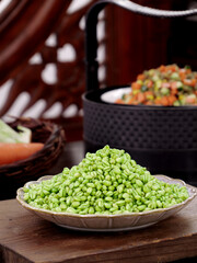 Fresh Green Wheat Kernels on Wooden Plate - Traditional Kitchen Cooking Ingredients