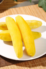 Fresh Yellow Sweet Potato Fingers on White Plate - Healthy Vegetable Snack Food
