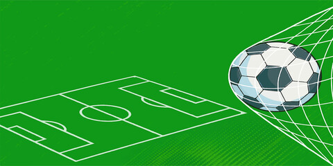 A soccer ball rests in the goal net on the green grass of a football pitch during a championship game