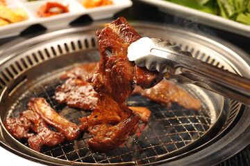 Grilled Korean Pork Ribs on Charcoal BBQ Grill