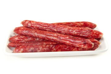 Cantonese Style Air-Dried Sweet Sausages on White Plate - Traditional Chinese Spicy Meat Delicacy
