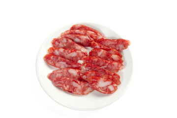 Sweet Cantonese Air-Dried Sausages Sliced on White Plate - Traditional Chinese Preserved Meat