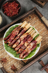 Inner Mongolia Spicy Grilled Meat Skewers Traditional Late Night Street Food with Cumin and Chili Spices