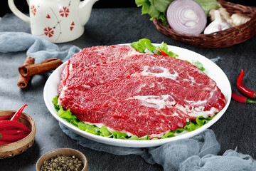 Fresh Raw Beef Brisket Slices with Vegetables and Spices for Cooking