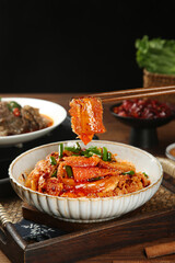 Traditional Spicy Cold Shredded Tripe Asian Cuisine with Chopsticks and Side Dishes