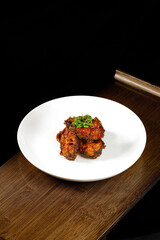 Shanghai Sweet and Sour Smoked Fish Special Dish on White Plate with Scallion Garnish