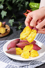 Fresh Steamed Sweet Potatoes with Golden Flesh on White Plate - Healthy Natural Food Concept