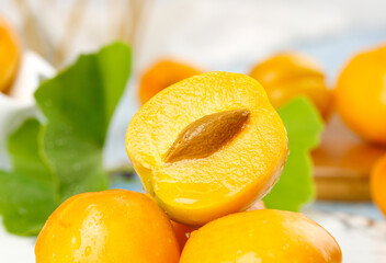 Fresh Ripe Apricots with Green Leaves - Healthy Organic Stone Fruit