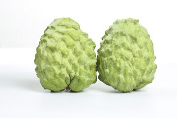 Fresh Bergamot Citrus Fruits with Bumpy Green Skin on White Background