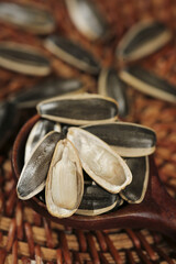 Black Sunflower Seeds in Wicker Basket - Healthy Natural Snack and Cooking Ingredient