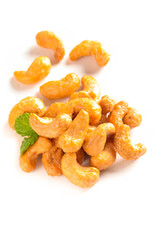 Crispy Vietnamese Salt-Baked Cashew Nuts with Mint Garnish on White Background