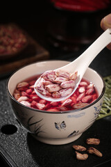 Fresh Red Speckled Beans in Bowl with Wooden Spoon - Homegrown Organic Legumes for Healthy Cooking