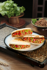 Handmade Tongguan Meat Buns Traditional Chinese Shaanxi Street Food on Wooden Table