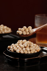 Fried Salt Chickpeas from Xinjiang - Traditional Chinese Legume Snack in Rustic Bowl Setting