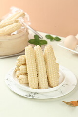 White Mini Corn Cobs from Xishuangbanna - Fresh Aromatic Sticky Corn Variety on Marble Plate