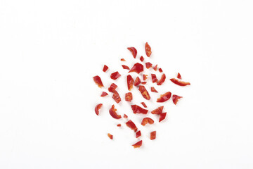 Dried Red Chili Pepper Flakes Scattered on White Background - Sichuan Spice Ingredient